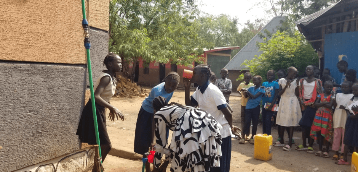 Children drinking clean water